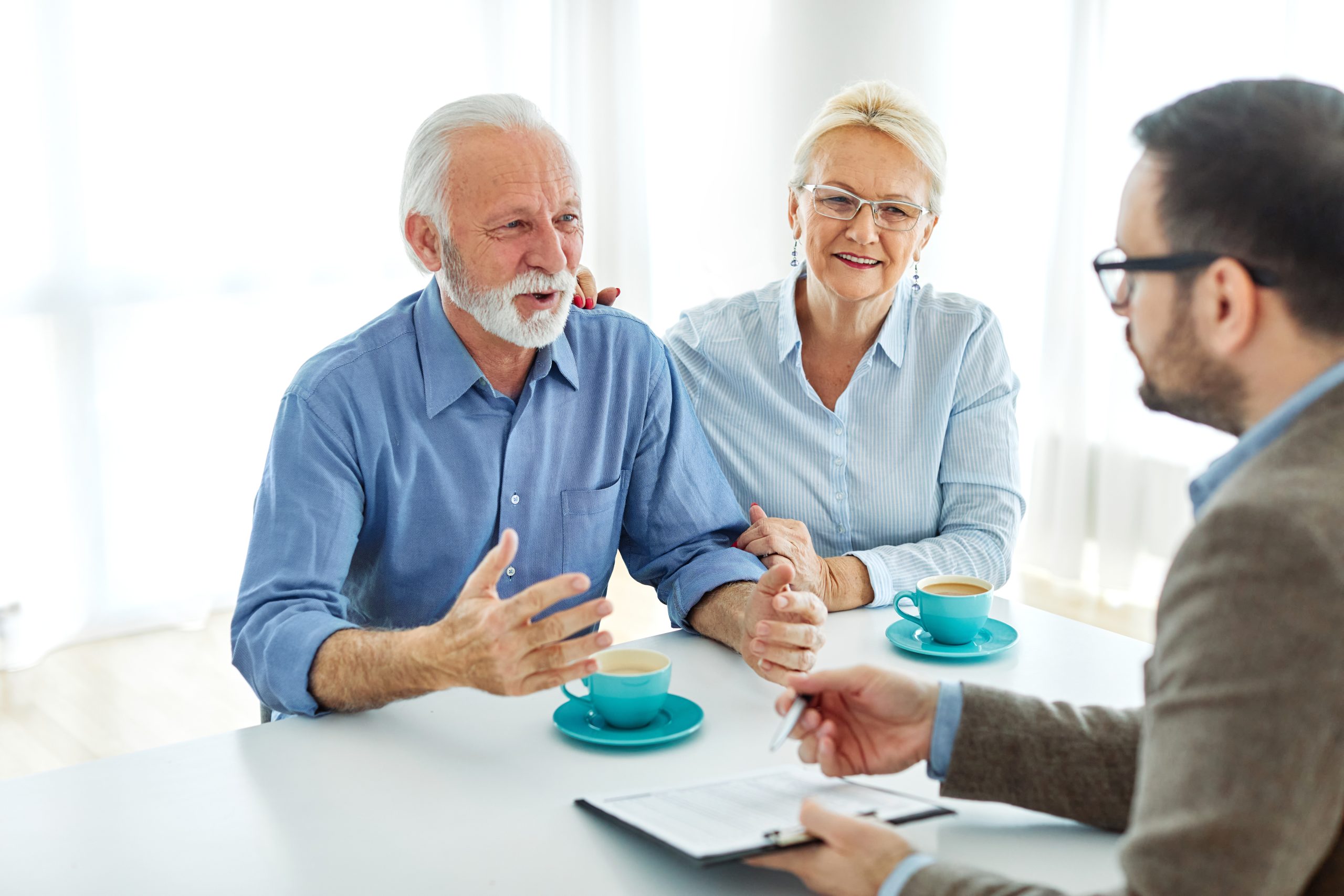 meeting agreement investment couple contract advice retirement consultation house finance senior elderly insurance senior couple office